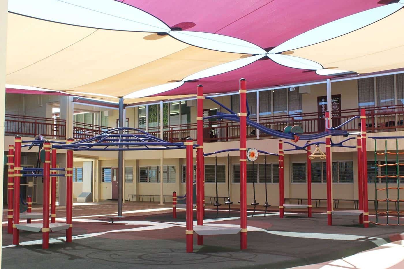 Shade sails over the playground and buildings at a Townsville school