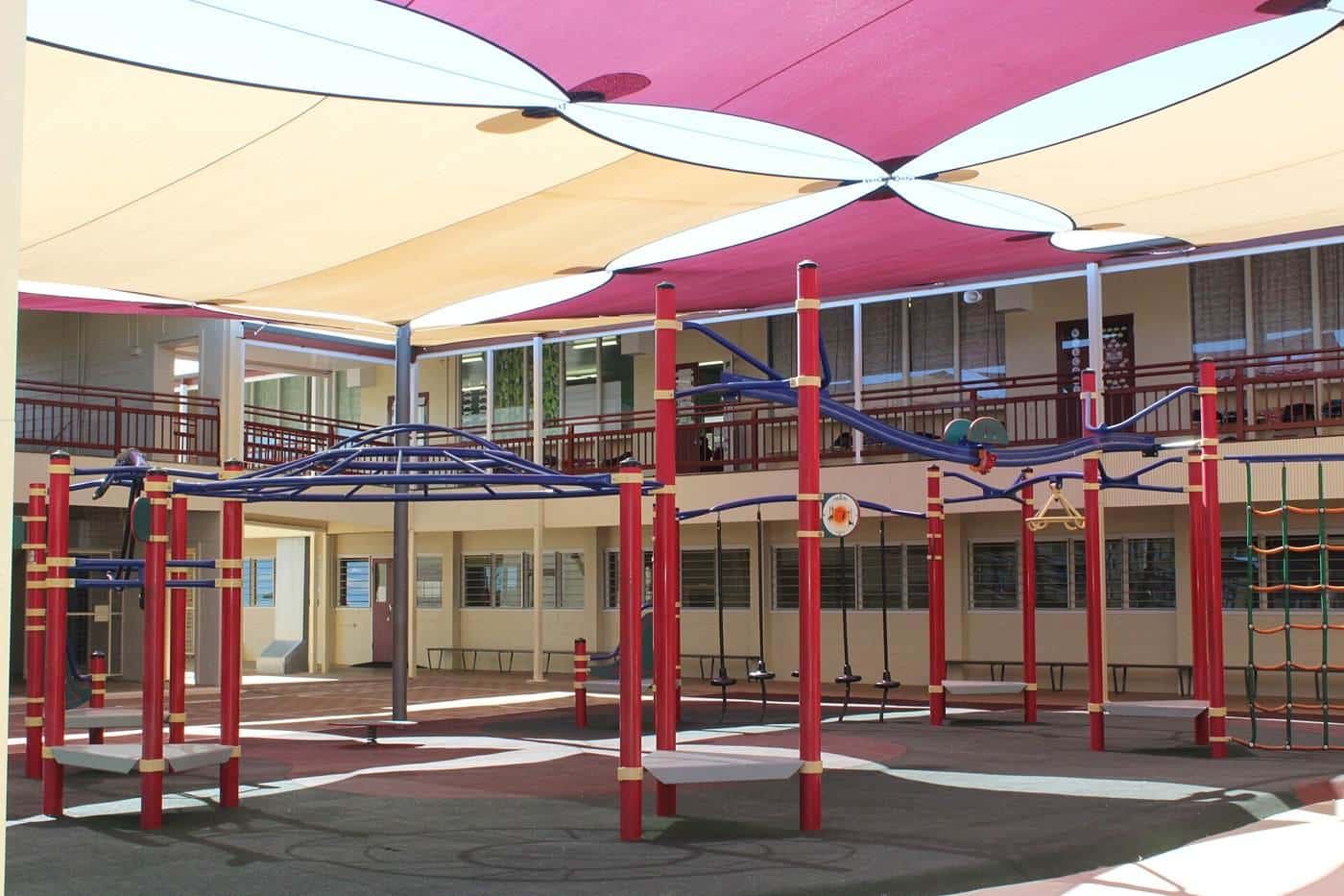 Shade sails over the playground and buildings at a Townsville school